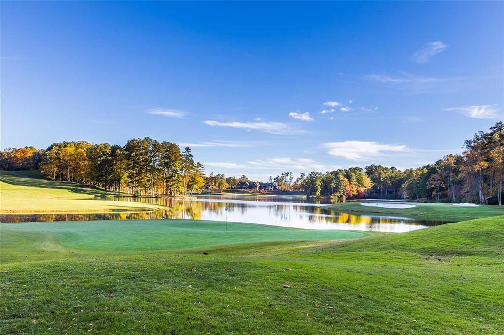 807 Choctaw Pass Big Canoe, GA 30143 - Photo 5 of 6 a view of a house with a big yard
