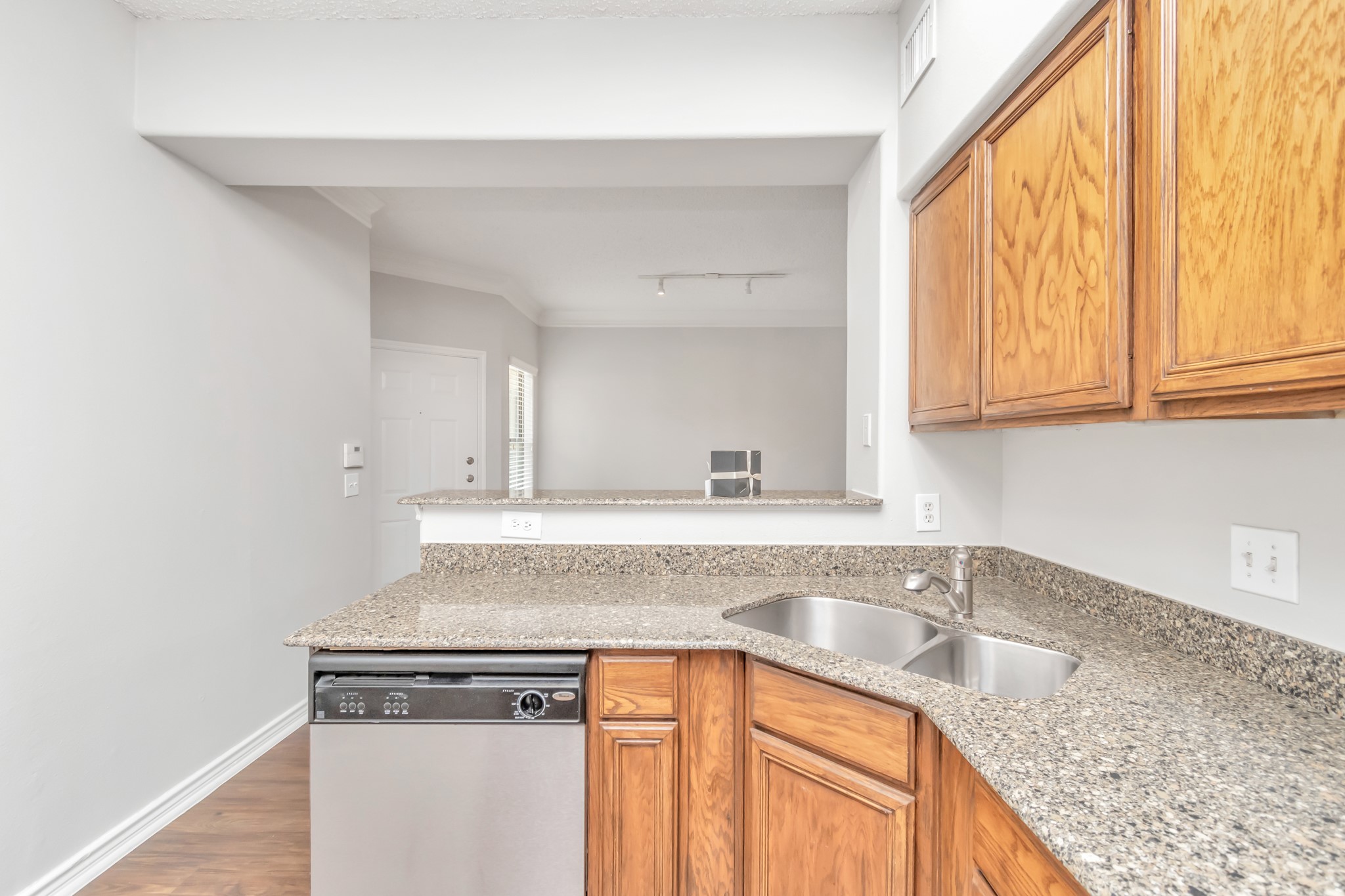 1600 Eldridge Parkway South, Unit 805 Houston, TX 77077 - Photo 11 of 39 a kitchen with granite countertop a sink and a stove