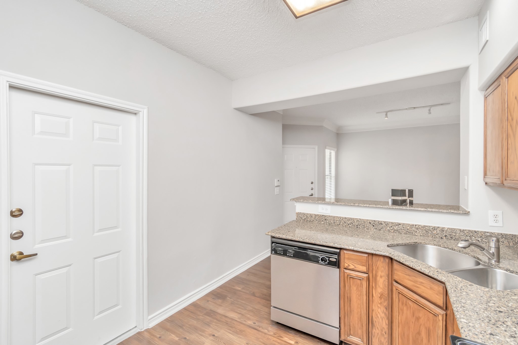1600 Eldridge Parkway South, Unit 805 Houston, TX 77077 - Photo 12 of 39 a view of a kitchen counter space and front door