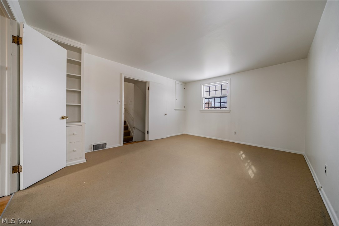 4602 College Road South Euclid, OH 44121 - Photo 13 of 26 Unfurnished bedroom featuring light carpet and baseboards