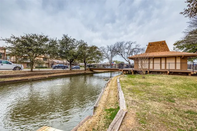 a house with swimming pool in front of it