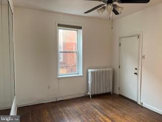 6243 Haverford Avenue, Unit 2 Philadelphia, PA 19151 - Photo 12 of 17 an empty room with a window and a chandelier fan