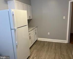 6243 Haverford Avenue, Unit 2 Philadelphia, PA 19151 - Photo 10 of 17 a view of walk in closet with wooden floor
