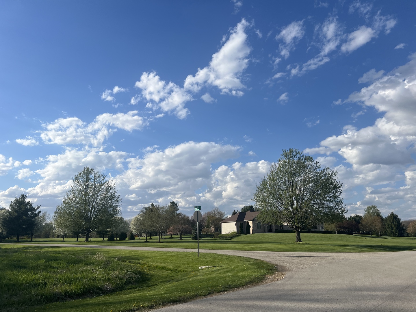 10909 Pebble Drive Huntley, IL 60142 - Photo 3 of 8 a view of a golf course with a lake