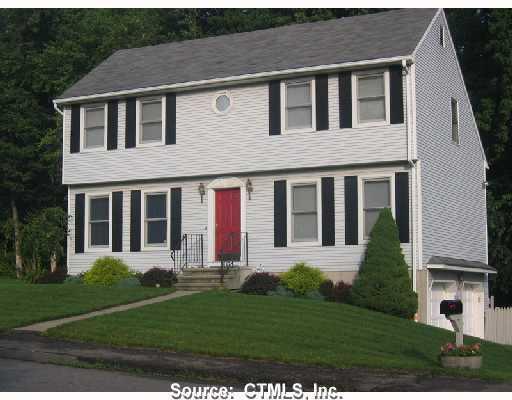 312 Ardsley Road Waterbury, CT 06708 - Photo 1 of 1 a front view of a house with a yard