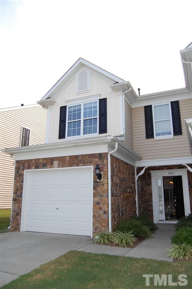 8312 Pilots View Drive Raleigh, NC 27617 - Photo 1 of 10 a front view of a house with garden