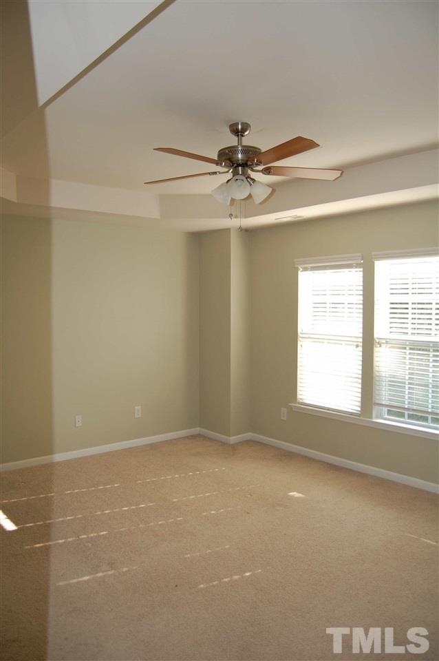 8312 Pilots View Drive Raleigh, NC 27617 - Photo 4 of 10 a view of an empty room with a window
