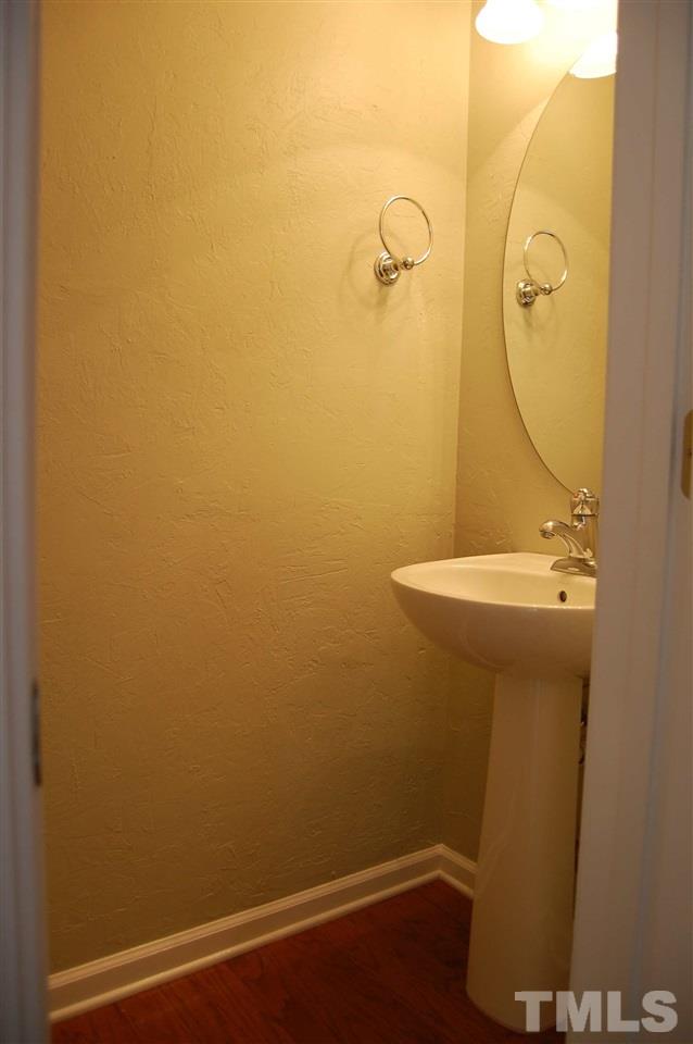 8312 Pilots View Drive Raleigh, NC 27617 - Photo 9 of 10 a bathroom with a sink and a mirror