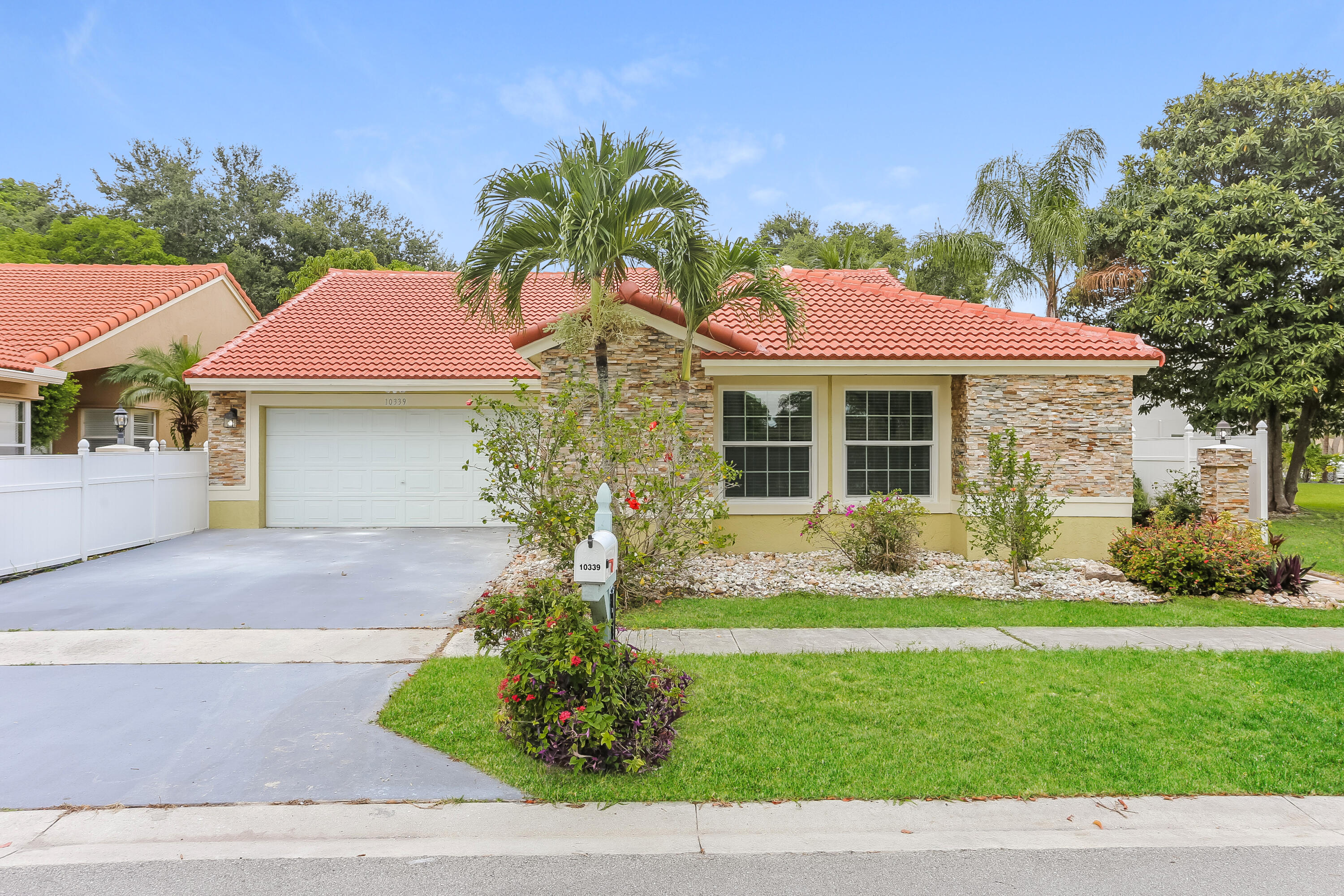 10339 Boca Springs Drive Boca Raton, FL 33428 - Photo 1 of 35 Front