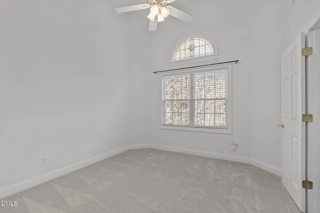 a bathroom with a bathtub sink and a mirror