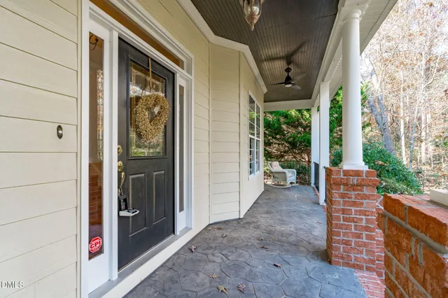a view of an entryway with wooden floor