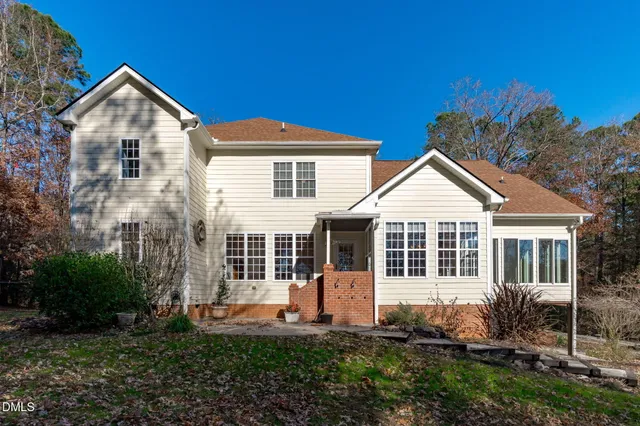 a backyard of a house with lots of green space