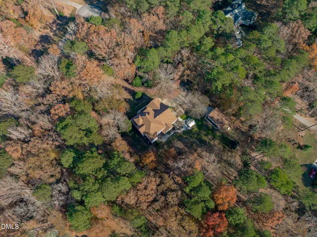 an aerial view of residential house with outdoor space