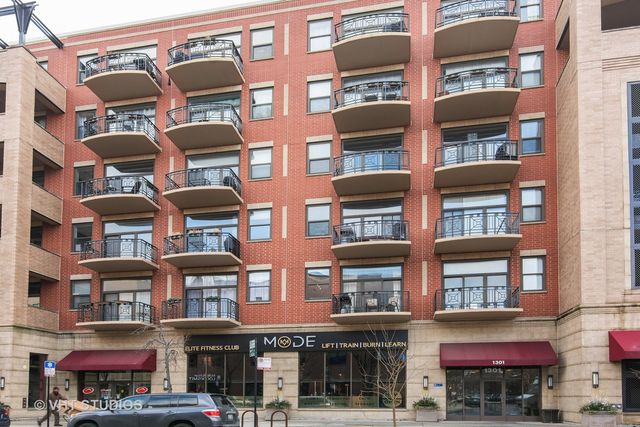 a bricked building with glass windows
