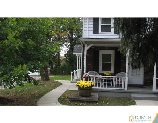 642 Ridge Road Monmouth Junction, NJ 08852 - Photo 7 of 25 a view of a house with backyard and porch