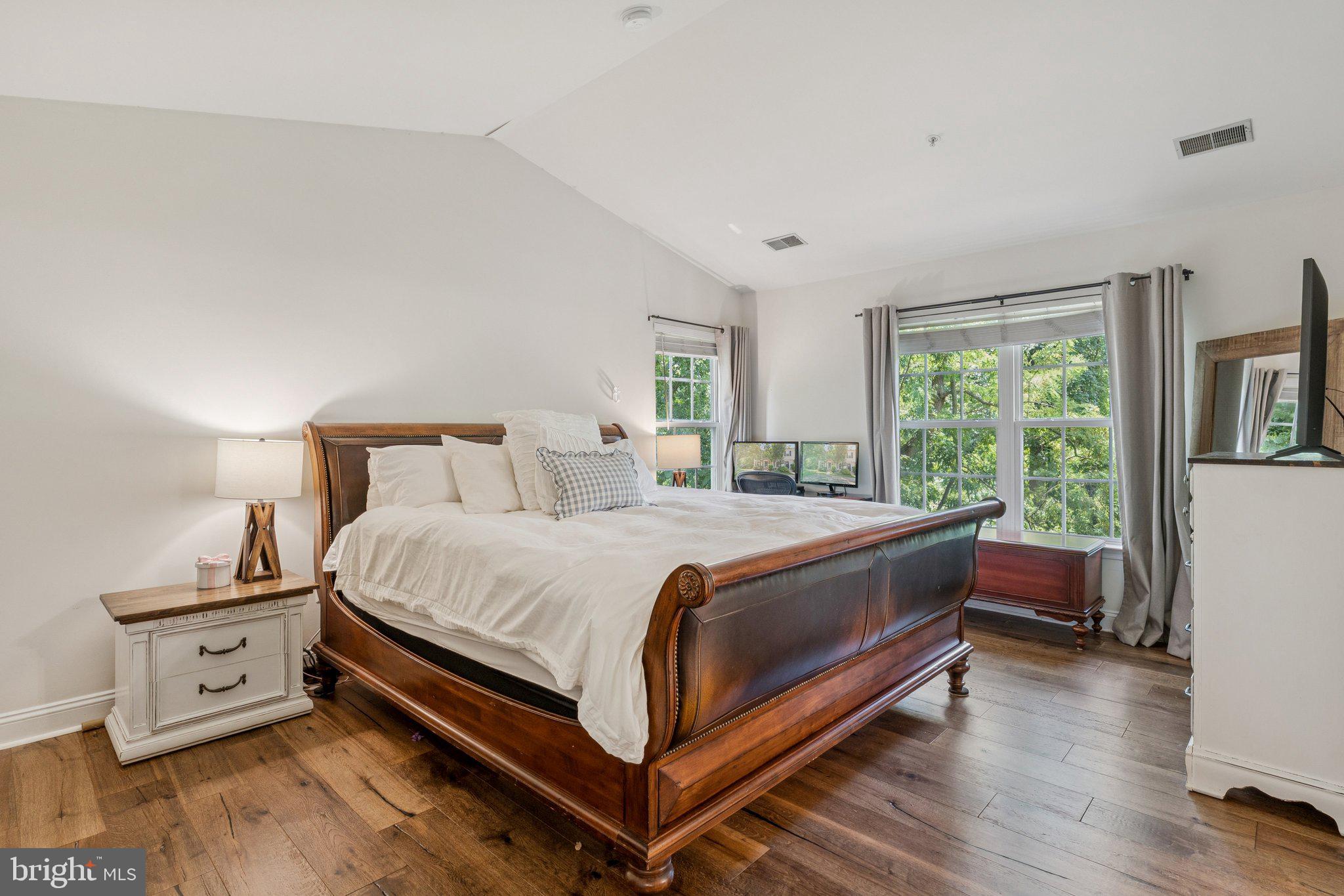 856 Stonehurst Drive Annapolis, MD 21409 - Photo 15 of 31 a bed room with a bed and a night stand