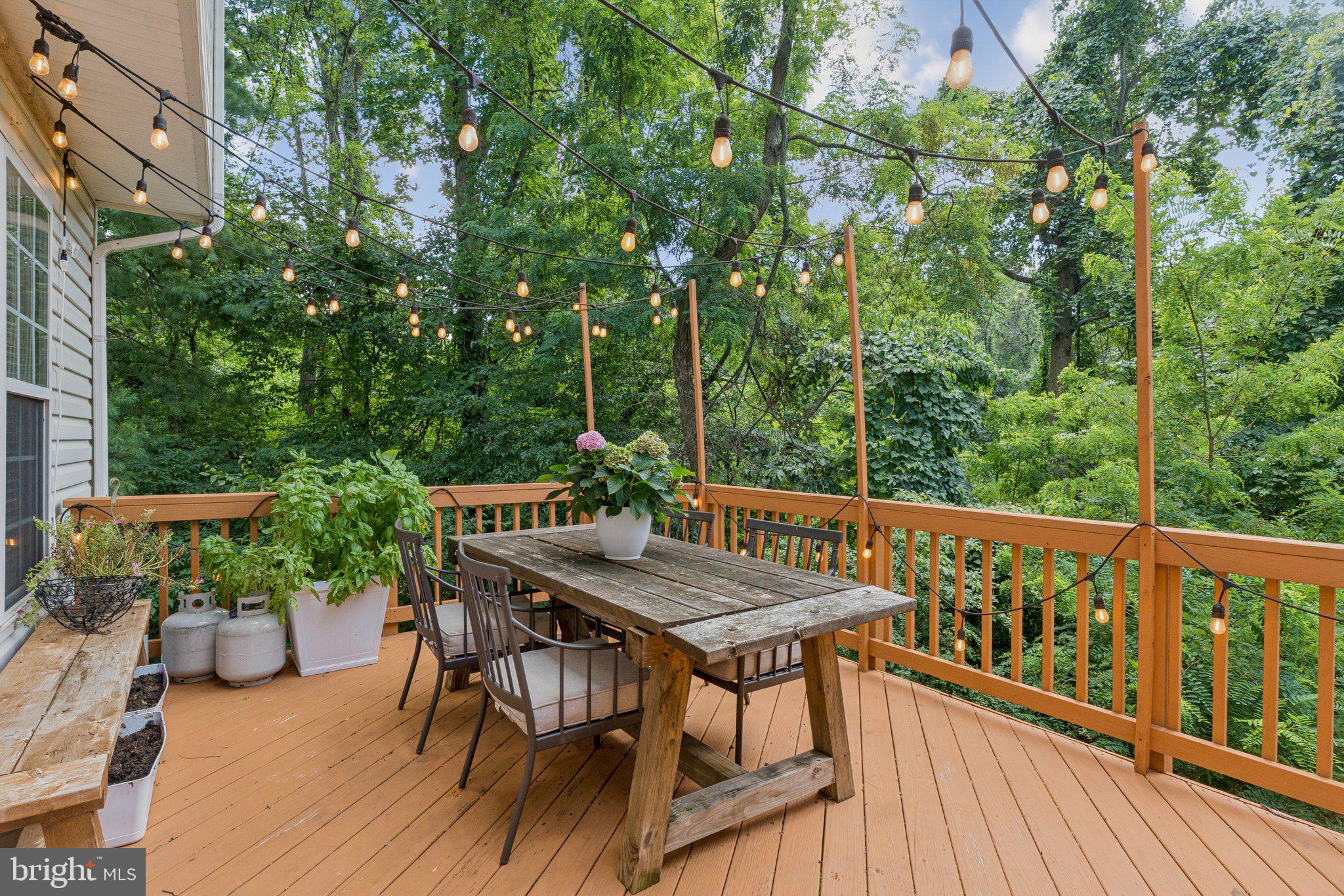 856 Stonehurst Drive Annapolis, MD 21409 - Photo 20 of 31 a balcony with wooden floor table and chairs