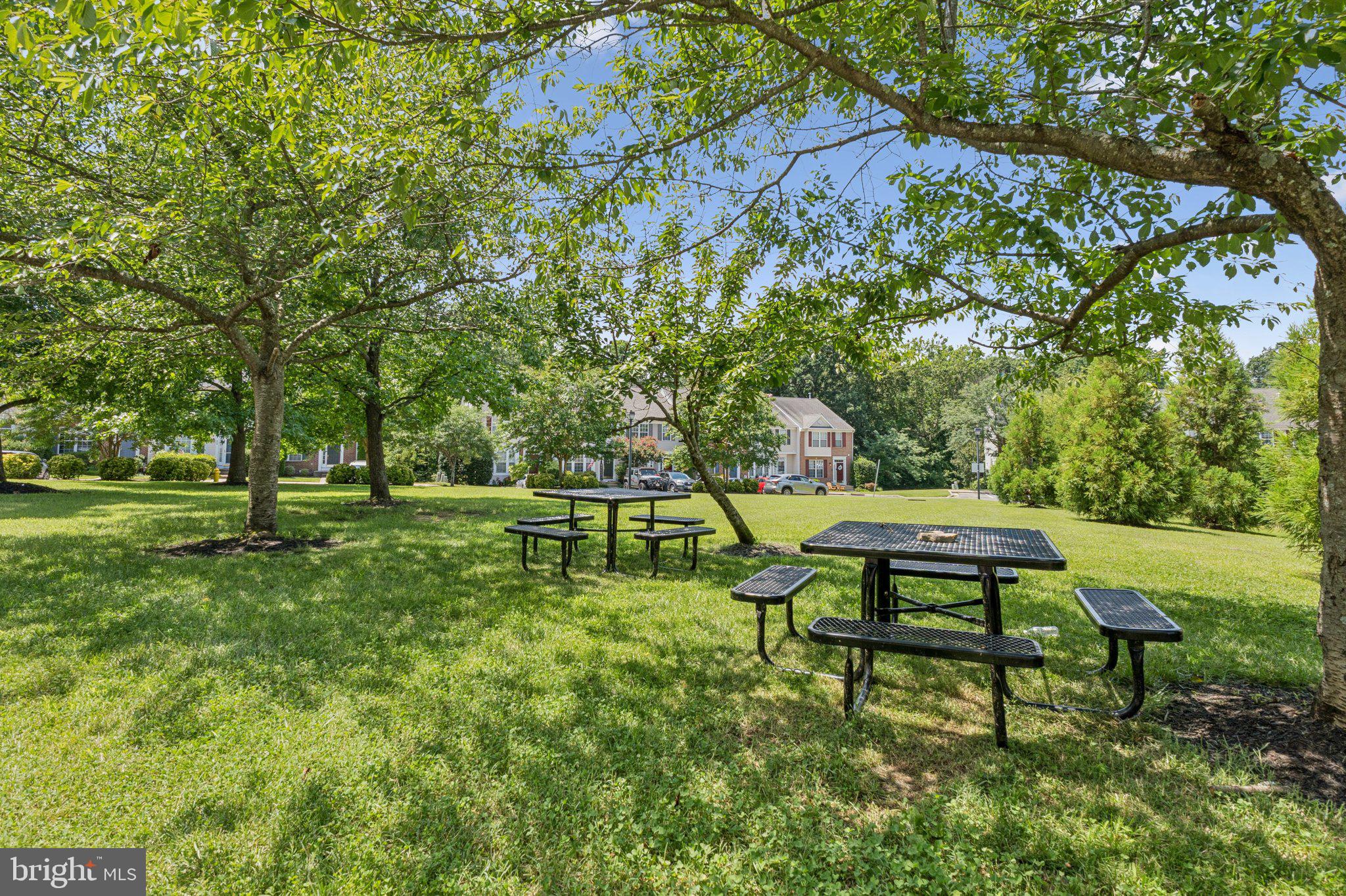 856 Stonehurst Drive Annapolis, MD 21409 - Photo 25 of 31 a backyard of a house with table and chairs