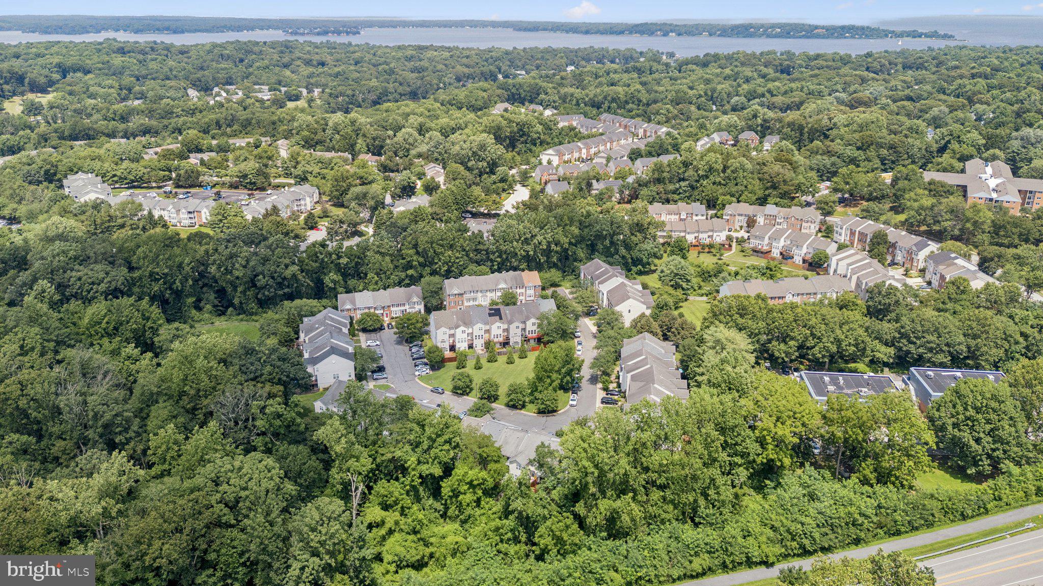 856 Stonehurst Drive Annapolis, MD 21409 - Photo 31 of 31 an aerial view of residential houses with outdoor space and trees