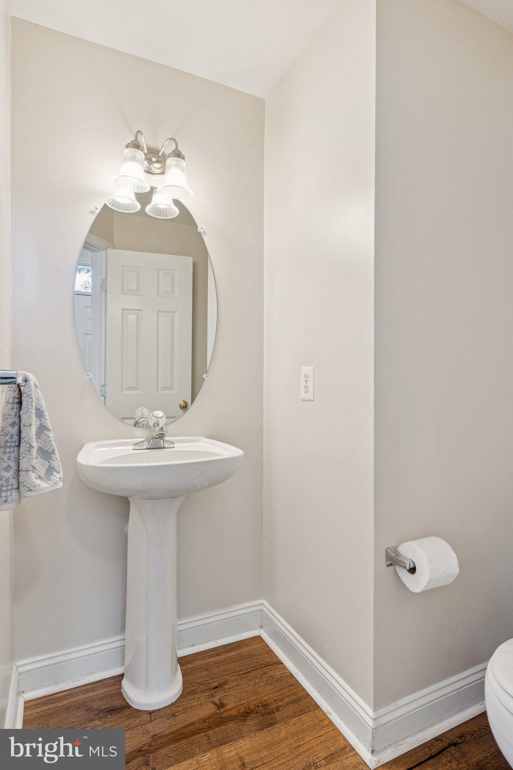 856 Stonehurst Drive Annapolis, MD 21409 - Photo 9 of 31 a bathroom with a sink and mirror