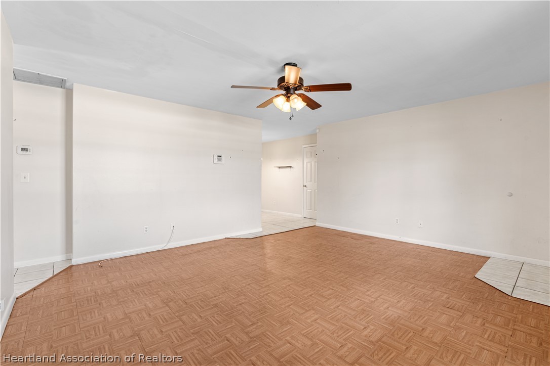 3303 Lakewood Road Sebring, FL 33875 - Photo 21 of 34 a view of a big room with carpet