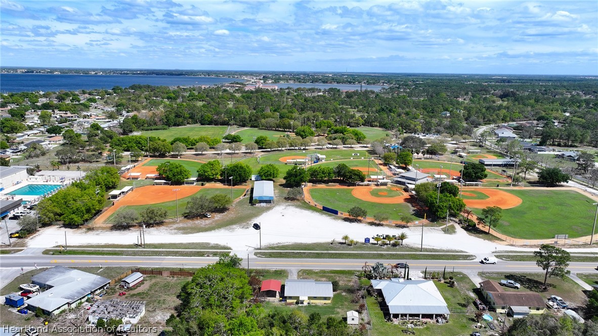 3303 Lakewood Road Sebring, FL 33875 - Photo 9 of 34 an aerial view of a city