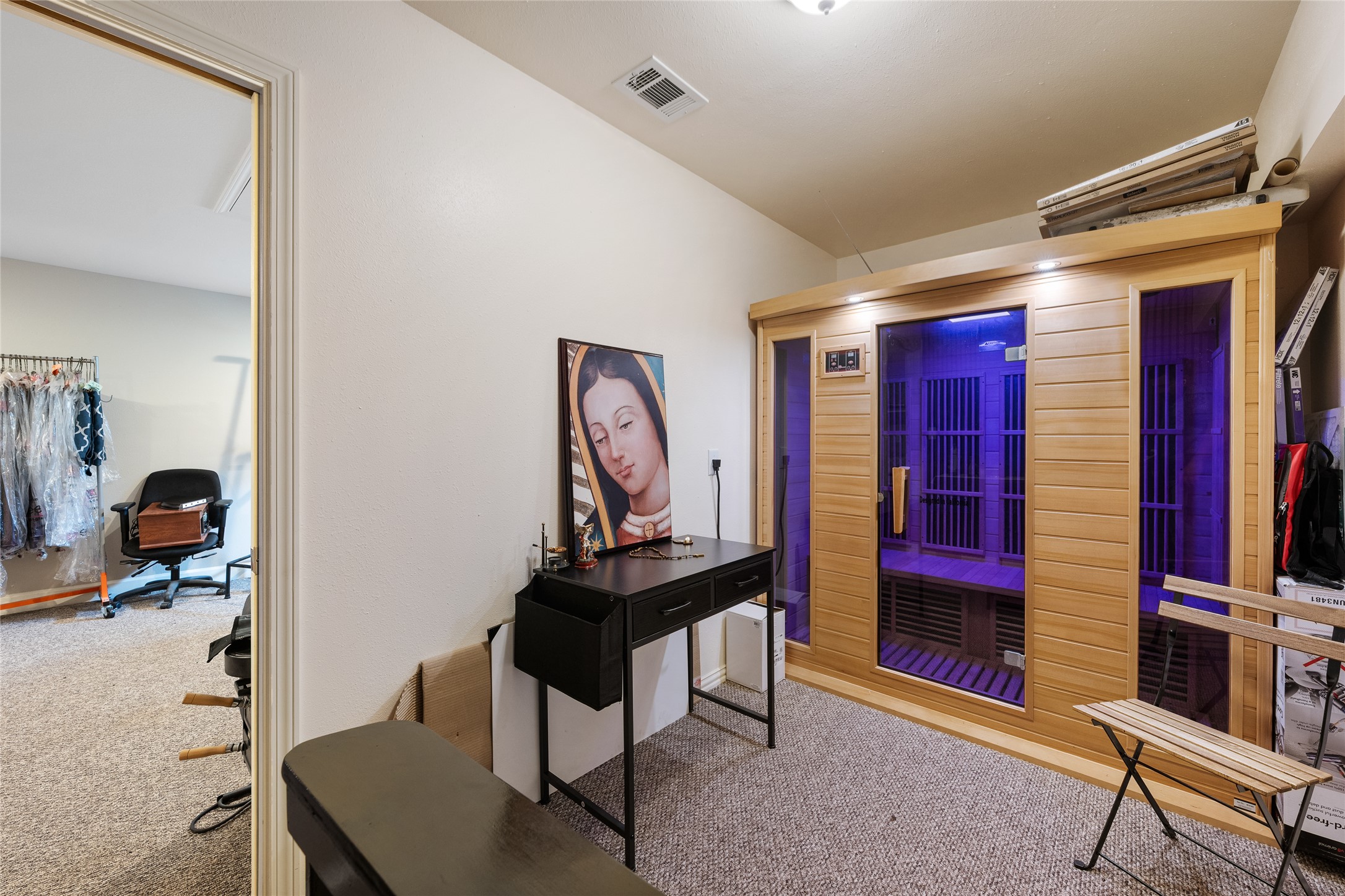 301 Oak Ridge Road Georgetown, TX 78628 - Photo 17 of 34 Dedicated room featuring a built-in sauna with a glass door and wood-finish paneling