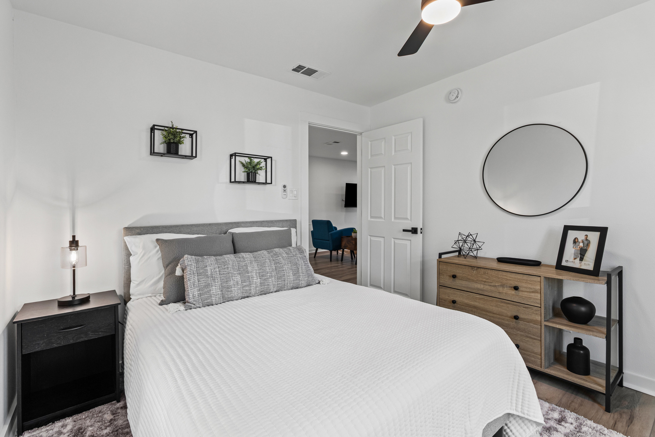 901 North Church Street Georgetown, TX 78626 - Photo 19 of 32 Bedroom featuring wood finished floors and a ceiling fan