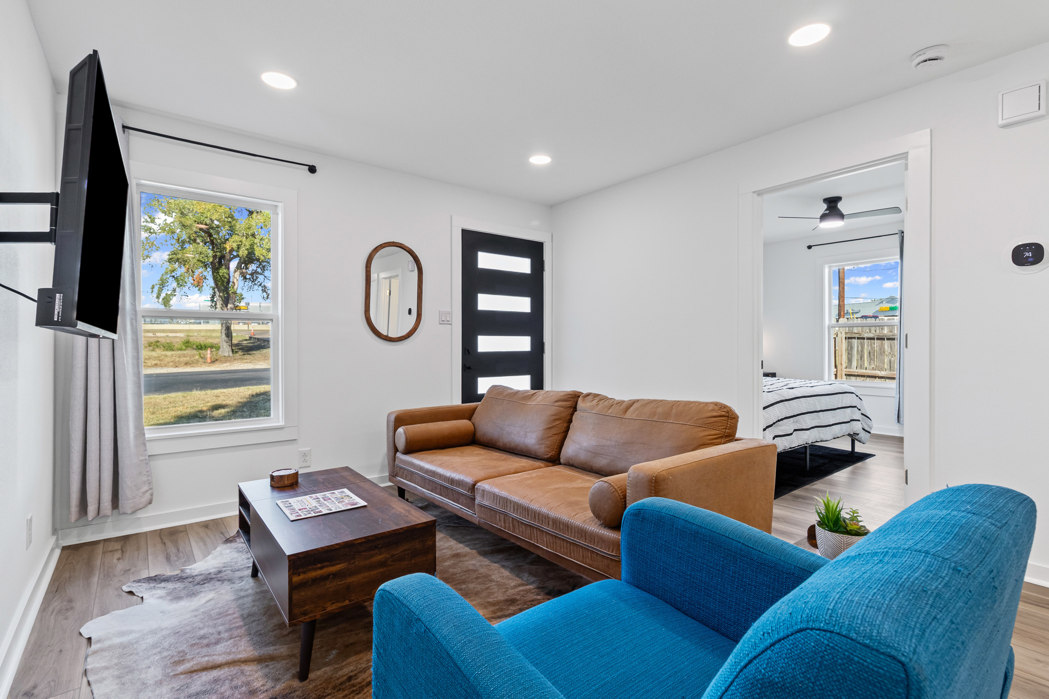 901 North Church Street Georgetown, TX 78626 - Photo 5 of 32 Living room with wood finished floors, recessed lighting, and a ceiling fan