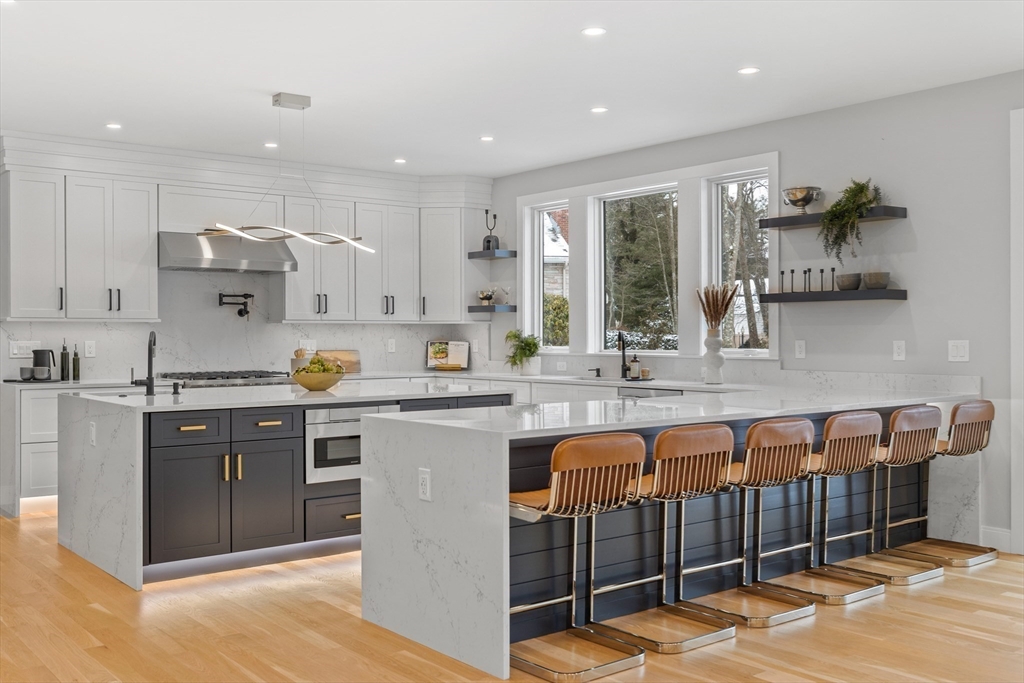 68 Longmeadow Road Belmont, MA 02478 - Photo 1 of 39 a kitchen with stainless steel appliances granite countertop a sink and cabinets