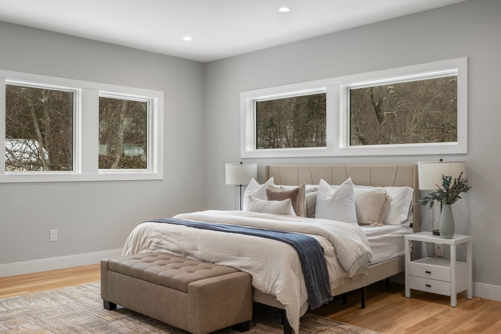68 Longmeadow Road Belmont, MA 02478 - Photo 19 of 39 a bedroom with a bed and a window