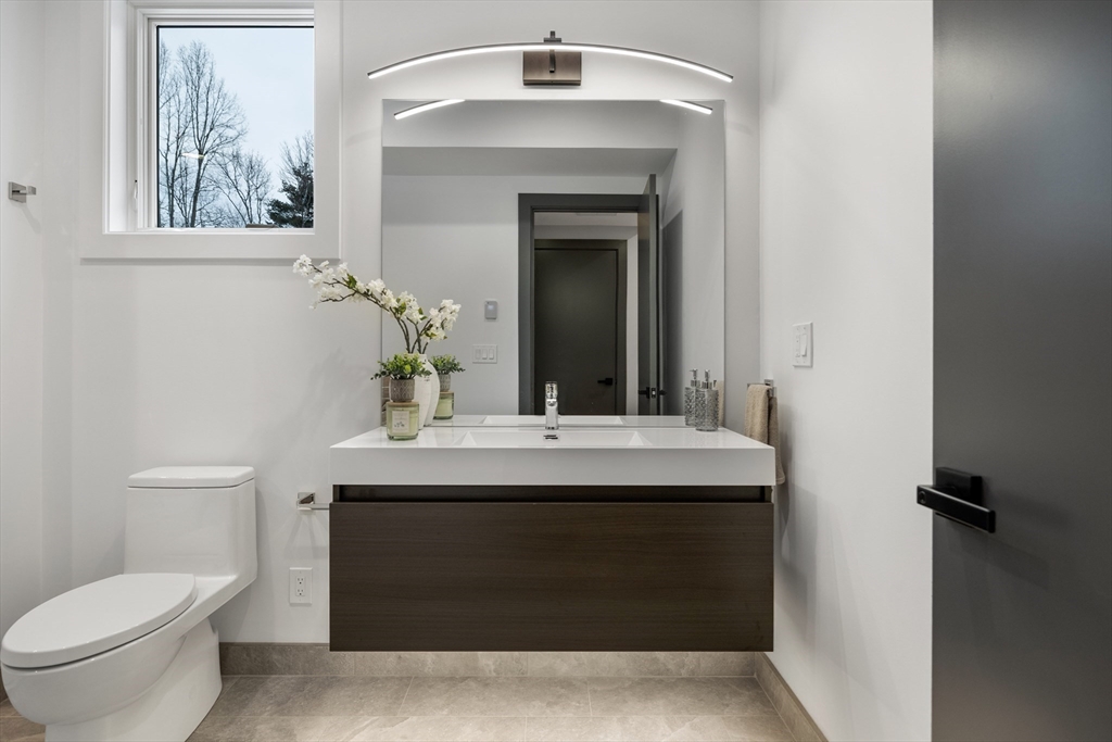 68 Longmeadow Road Belmont, MA 02478 - Photo 21 of 39 a bathroom with a sink and a toilet