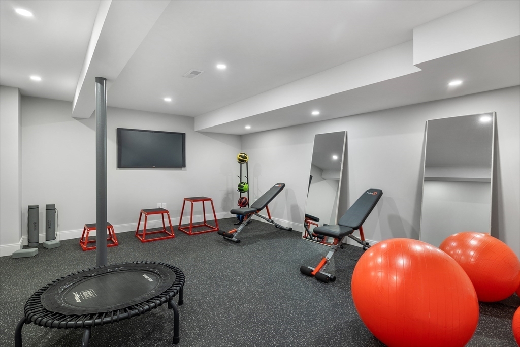 68 Longmeadow Road Belmont, MA 02478 - Photo 28 of 39 a room with gym equipment