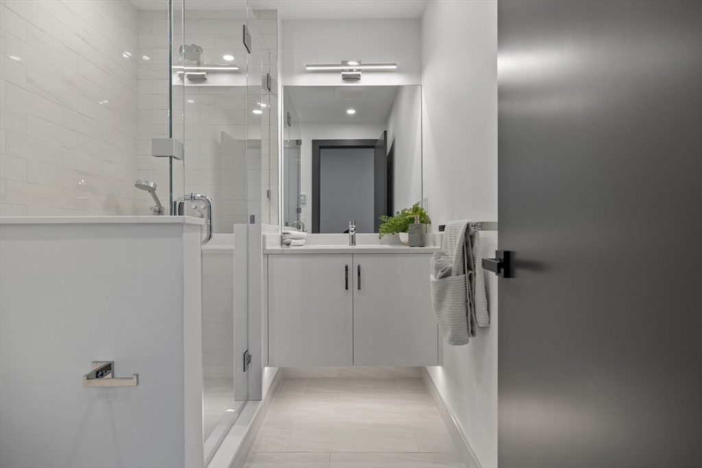 68 Longmeadow Road Belmont, MA 02478 - Photo 29 of 39 a bathroom with a sink and mirror