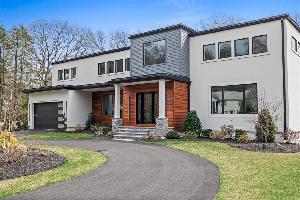 68 Longmeadow Road Belmont, MA 02478 - Photo 30 of 39 a front view of a house with a yard