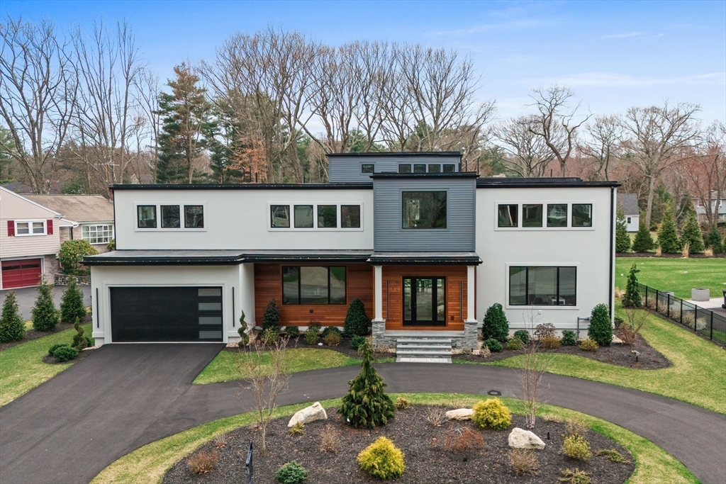 68 Longmeadow Road Belmont, MA 02478 - Photo 33 of 39 front view of a house with a yard