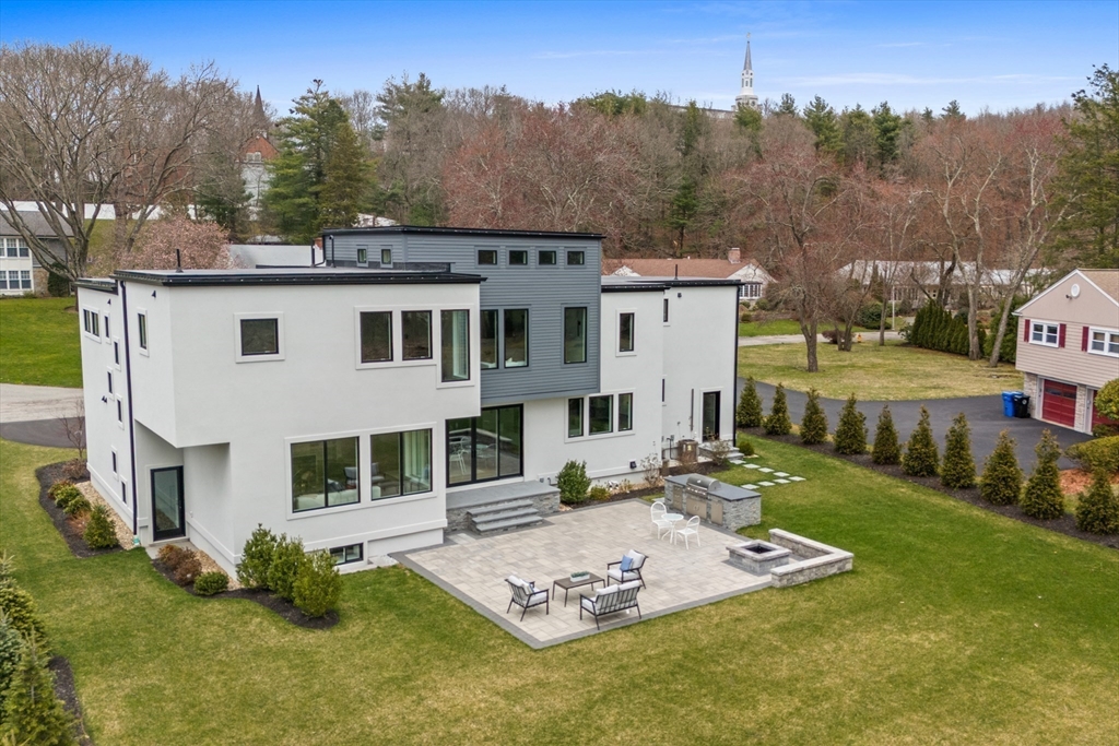 68 Longmeadow Road Belmont, MA 02478 - Photo 37 of 39 a view of a house with backyard and trees
