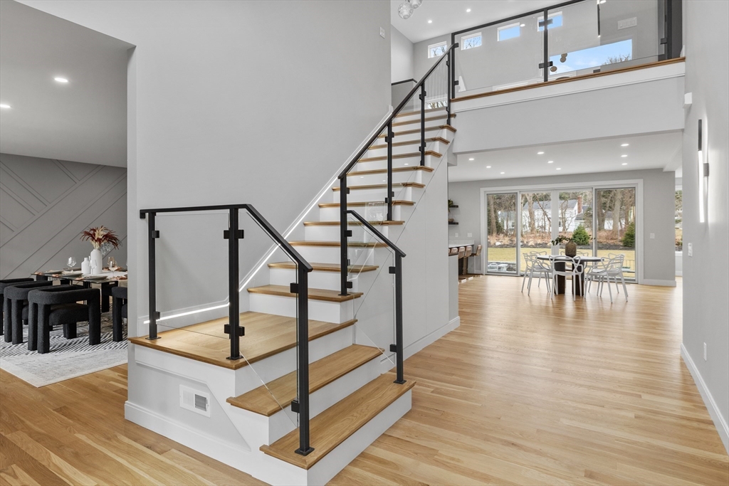 68 Longmeadow Road Belmont, MA 02478 - Photo 6 of 39 a view of entryway and hall with wooden floor