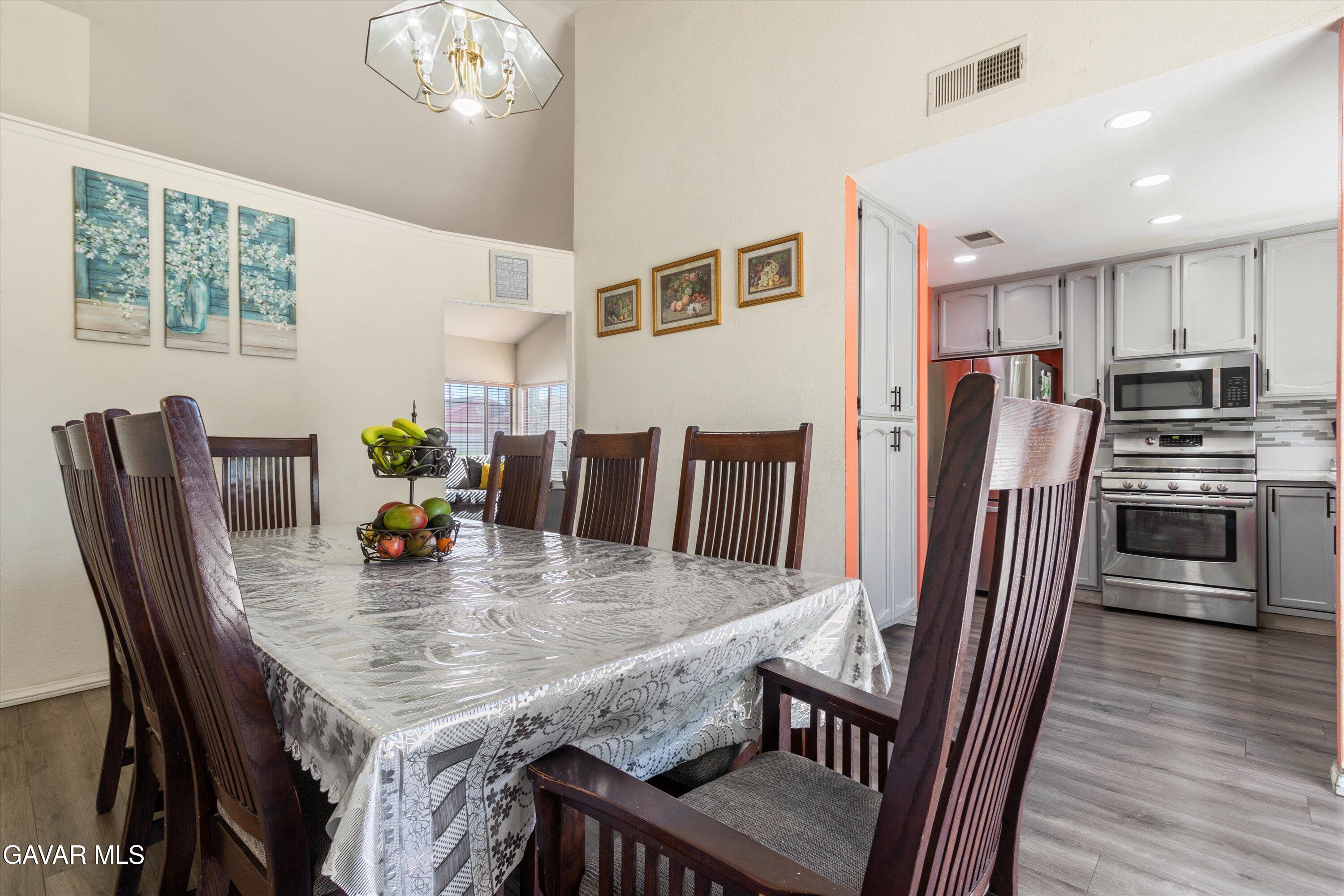 43653 Serenity Court, Unit 1 Lancaster, CA 93535 - Photo 11 of 18 a view of kitchen dining table and chairs