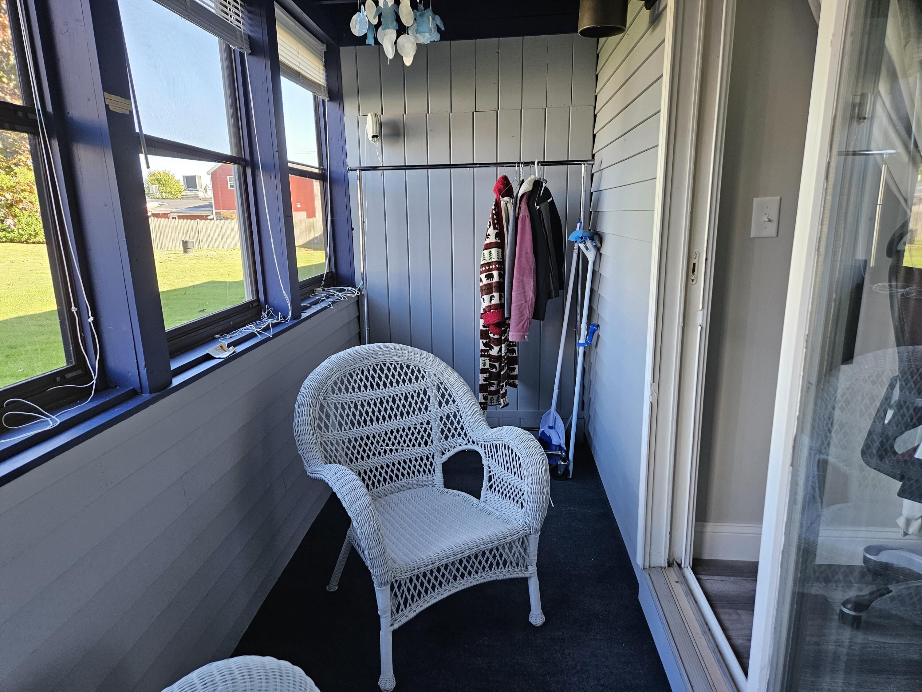 1072 Post Road, Unit 110 Wells, ME 04090 - Photo 10 of 17 porch with carpet
