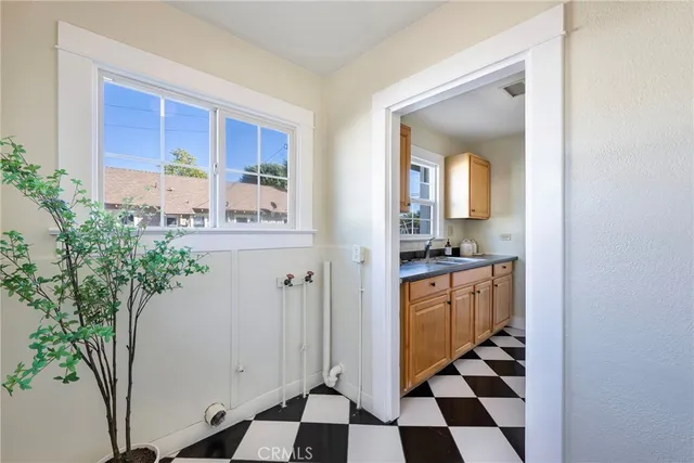 a room with windows and entrance