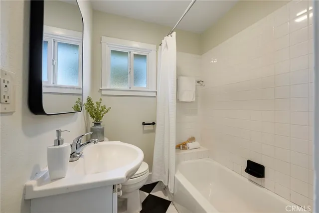 a bathroom with a sink and a bathtub