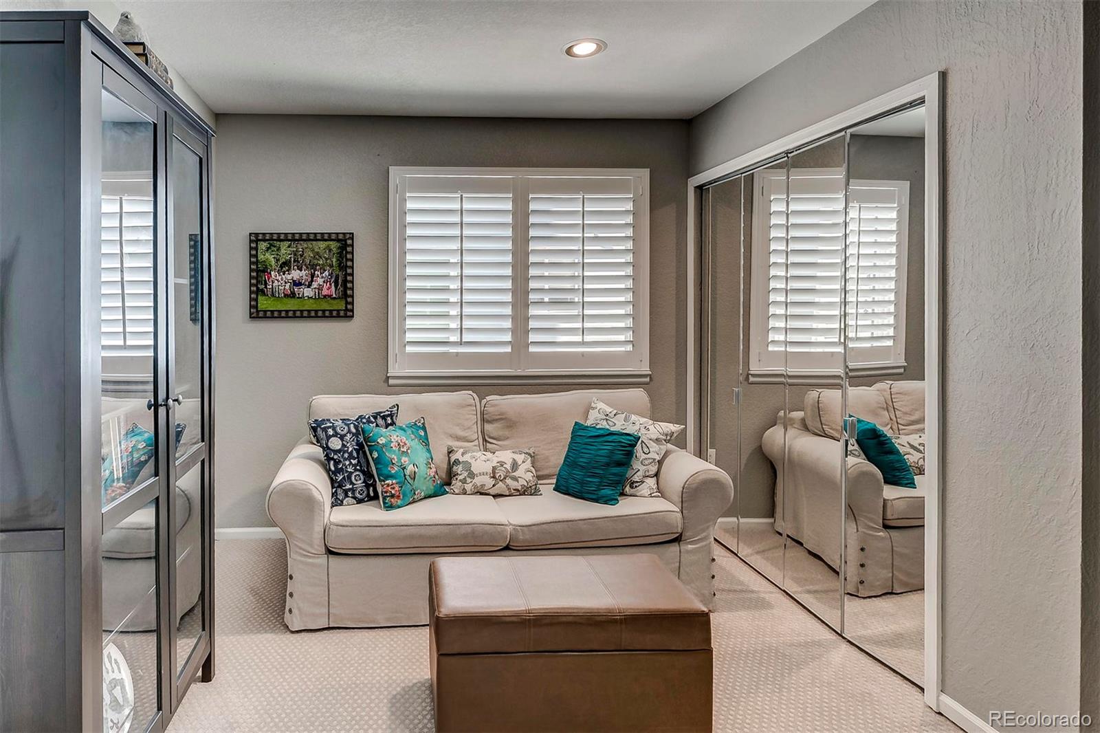9847 Spring Hill Lane Highlands Ranch, CO 80129 - Photo 22 of 33 a living room with furniture and window