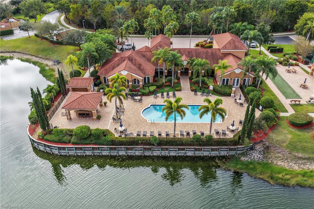 1820 Florida Club Circle, Unit 2103 Naples, FL 34112 - Photo 16 of 22 an aerial view of a house with outdoor space swimming pool and outdoor seating