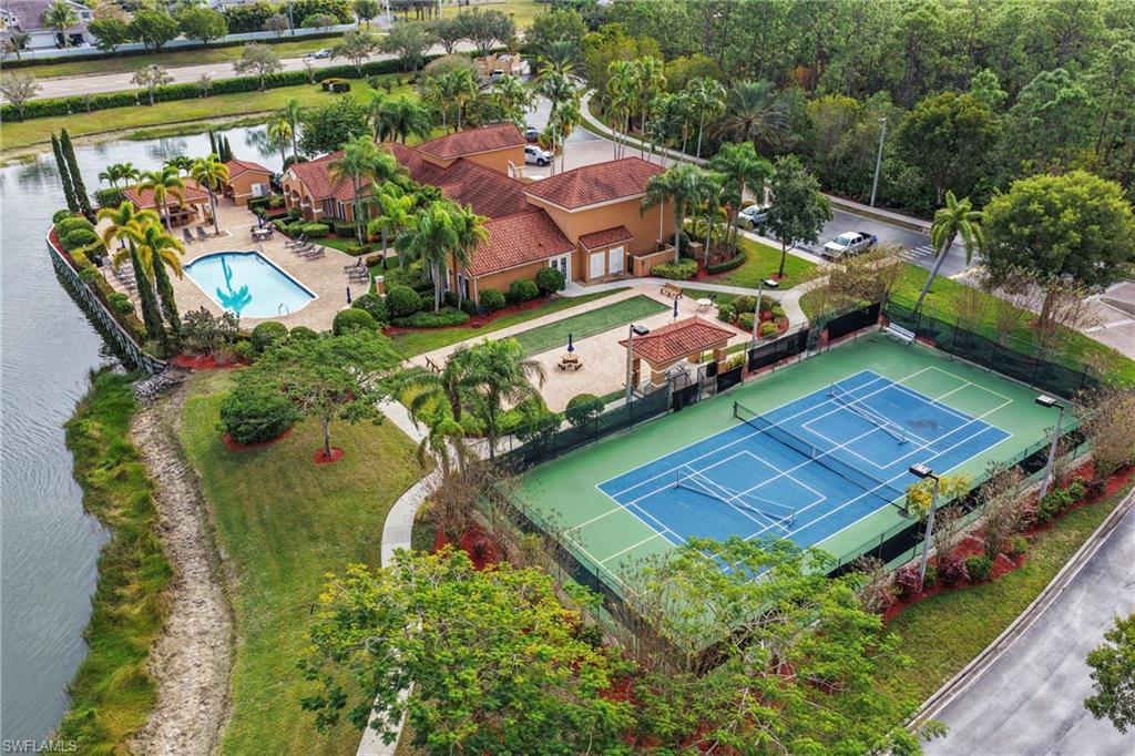 1820 Florida Club Circle, Unit 2103 Naples, FL 34112 - Photo 17 of 22 an aerial view of a house with a garden and lake view