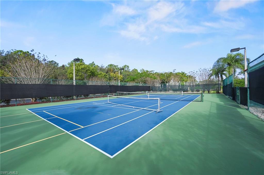1820 Florida Club Circle, Unit 2103 Naples, FL 34112 - Photo 20 of 22 a view of tennis court