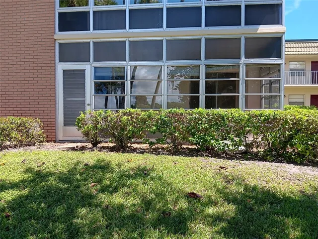 a view of a house with a garden
