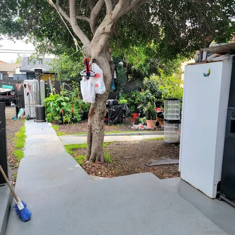 a front view of a house with yard