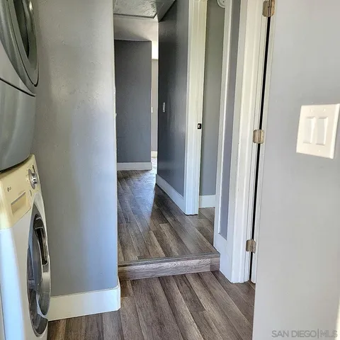 a view of front door with wooden floor