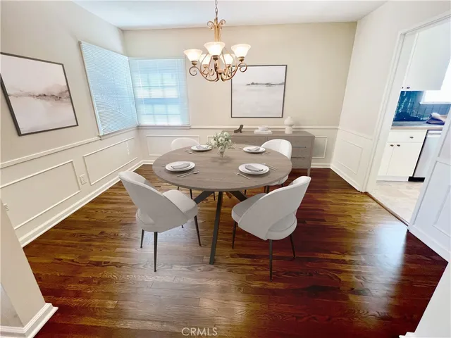 a kitchen with granite countertop a stove and a sink